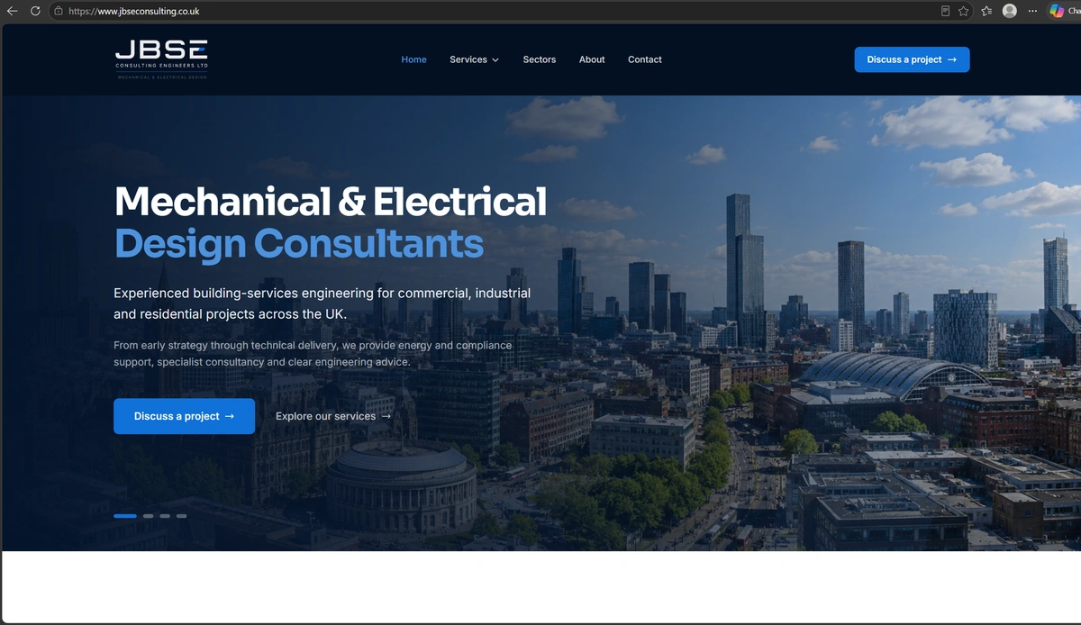 Homepage of jbseconsulting.co.uk: the JBSE Consulting Engineers logo, a headline reading Mechanical & Electrical Design Consultants, and an aerial photograph of the Manchester skyline.